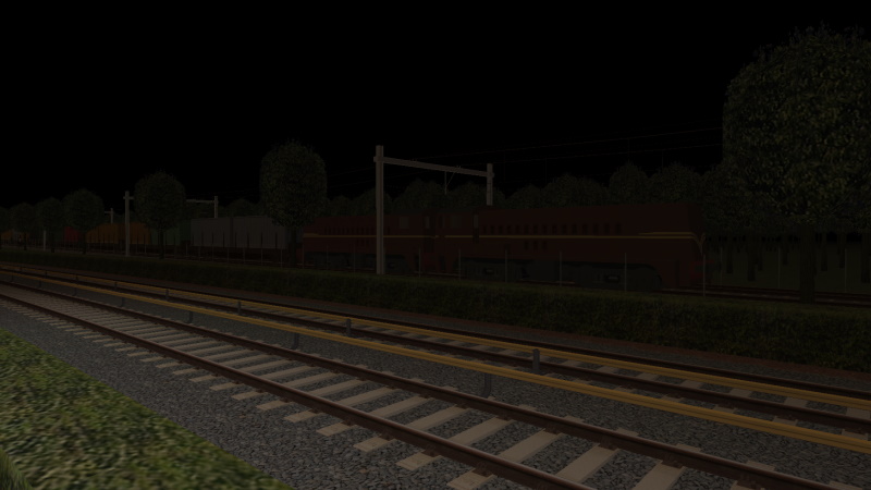 NS 2200 rumbles through Muziekbuurt with the freight working from Zeerwijk at around 23:45 on 29th September 2019.