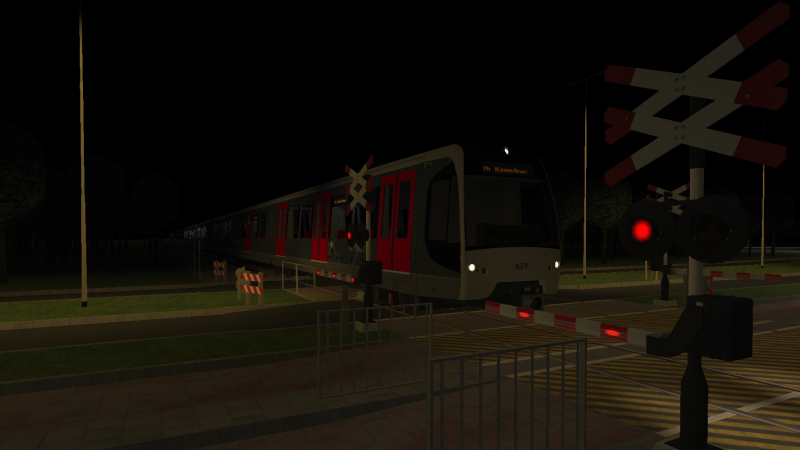 Metro Rijndam HSG3 with the Transferium Rijndijk to Rijndam Airport M4 Line train speeds through the level crossing <br />between Noorderpoort and 's Gravendijk on the late evening of 26th January 2020.