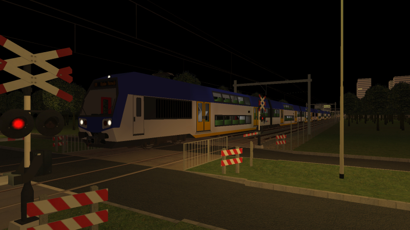 RijndamRail RR-DDM EMU passes through the level crossing at Houtweg on 23rd February 2020 as the train was forming <br />the 20:05 Noordvliet to Rijndam Molenwijk.