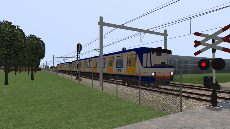 Several minutes later, NS 5200 Class EMU with the Essim to Simvilet service passes.