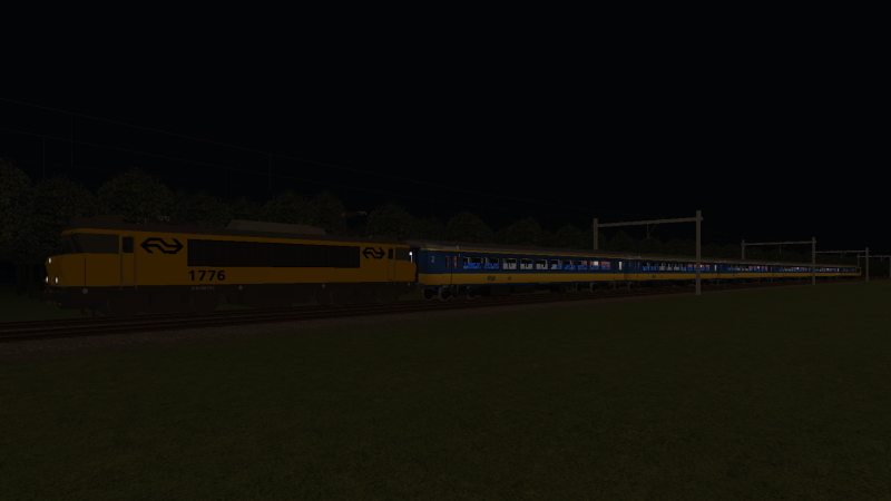 NS 1776 leads the evening Apeldoorn to Simvilet Centraal Intercity train on the evening of Thursday 10th March 2022 as the train speeds towards Delfsblaak.