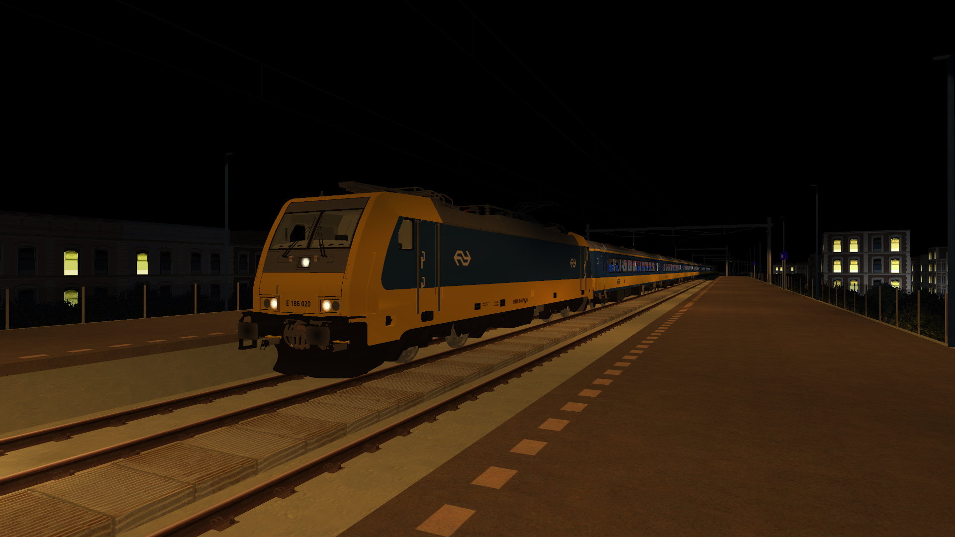 NS TRAXX forms an evening Simvilet Centraal to Rijndam Centraal Intercity Direct train as it sprints through Delfsblaak on Wednesday 13th March 2024.
