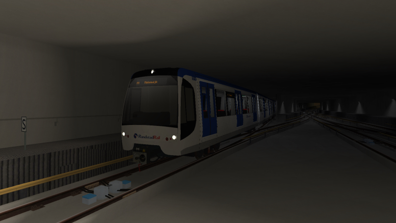 On the same evening, Metro Rijndam RSG3 unit snakes out of the tunnel as it arrives at Noorderpoort while operating the <br />Panbos to Molenwijk M1 Line train.