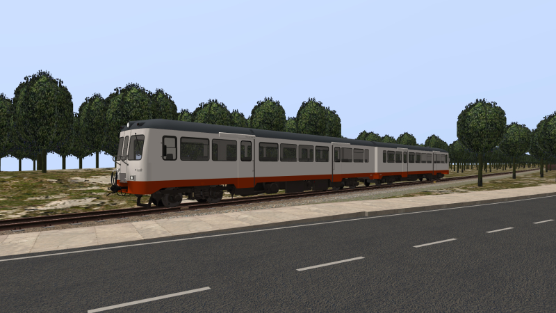 FGV 2300 DMU approaches the level crossing shortly after leaving Ademia on Sunday 19th September 2021 as this train <br />forms the afternoon service to Simtra.