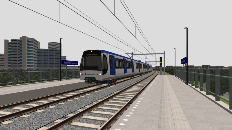 RanstadRail RSG3 EMU approaches Hageningen Kennispark with the Strandboulevard to Simvilet Centraal Line D working <br />on the afternoon of 23rd November 2021.
