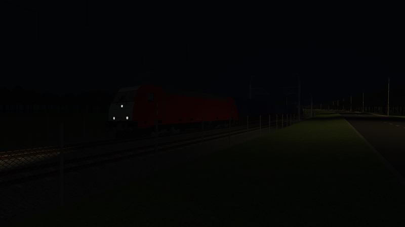 DB Cargo TRAXX emerges from the Essim-Hondwijk Tunnel at Hondwijk on the evening of Thursday 15th September 2022 while working the Nederdam Industrie to Vierdijk freight train.