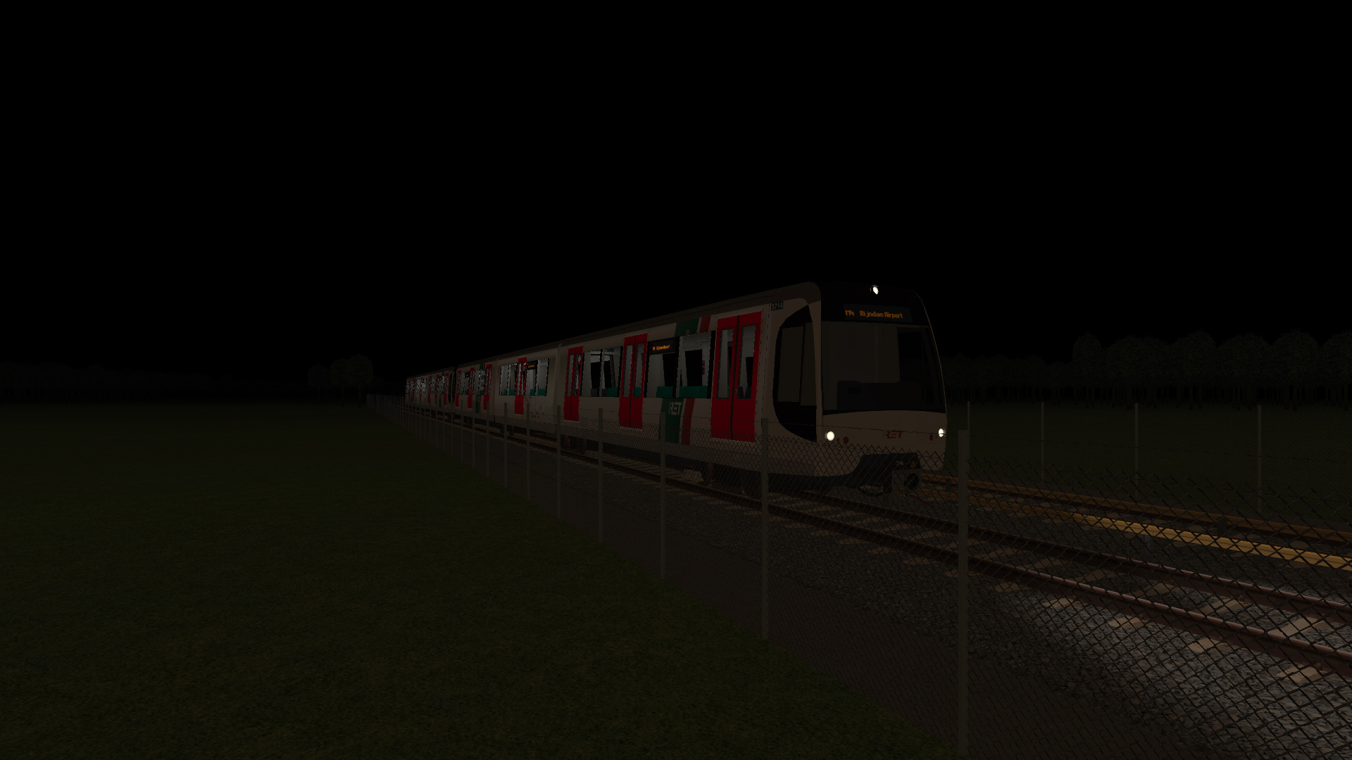 RET HSG3 EMU approaches 's-Gravendijk on the late night of 25/26th April 2024 with the 00:22 'Line M4' service to Rijndam Airport.